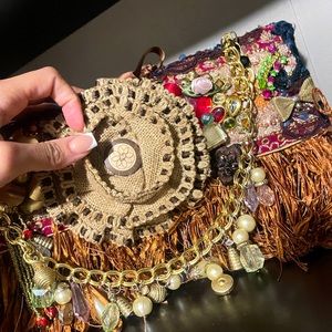 Beautiful unique clutch for a big statement in your outfit.
